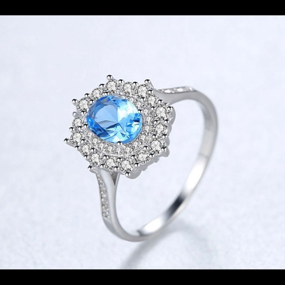 925 Sterling Silver With White Gold Plated Delicate Blue Topaz Oval Band Ring